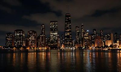 Chicago skyline at night reflected in water for local dating connections